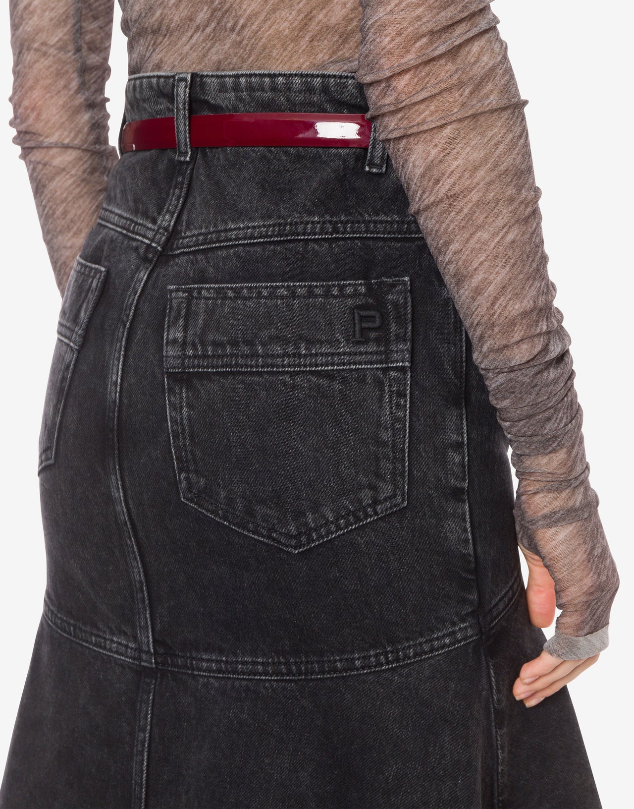 Black denim skirt with P embroidery